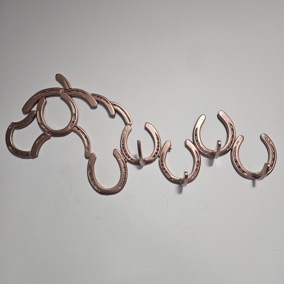 Horseshoe coat hanger